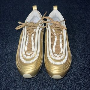 gold nike shoes